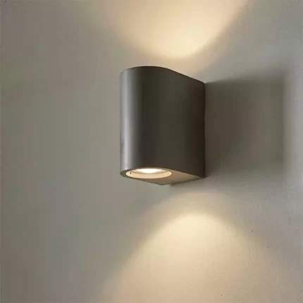 Wall washer light made from smooth grey concrete
