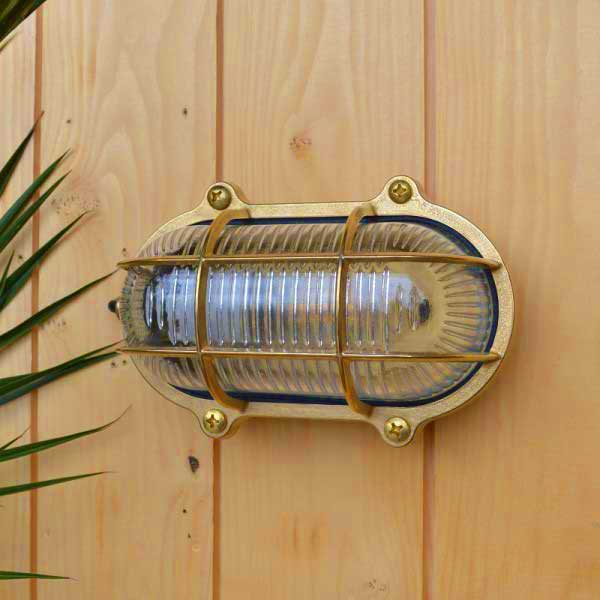 Oval outdoor wall light