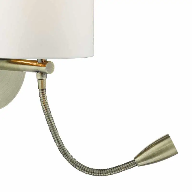 Dual wall light in antique brass finish