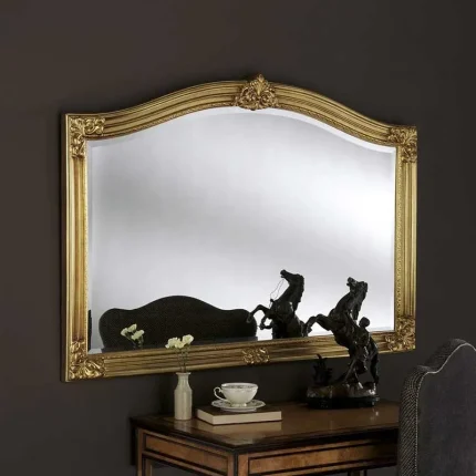 Arched overmantle mirror in gold colour frame