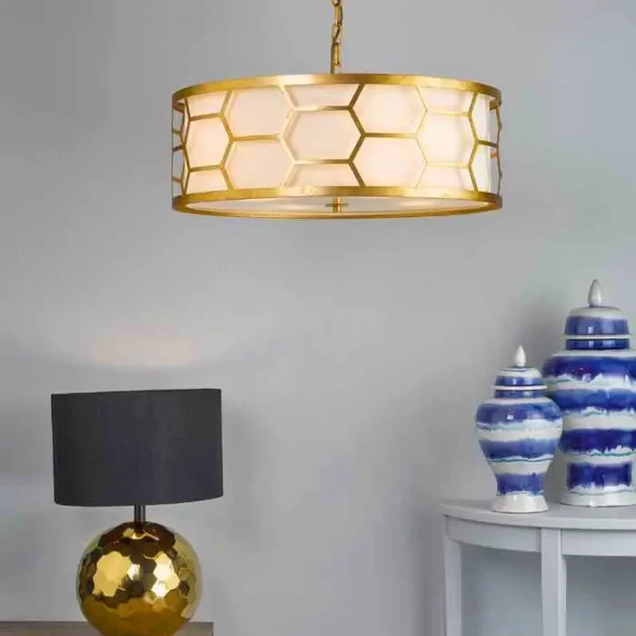 Gold ceiling light with ivory shade