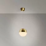 Orb pendant light in satin brass finish