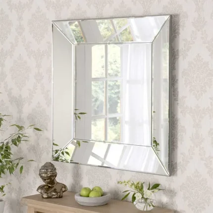 Curved modern mirror in rectangle design and silver frame