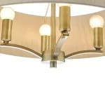 Pendant light with taupe shade in antique brass finish