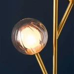 Floor lamp with clear glass shades and inner frosted glass diffusers