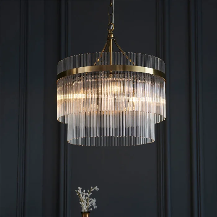 3 light pendant light in antique brass finish with clear glass