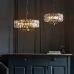 3 light and 5 light pendant light in antique brass finish with clear glass