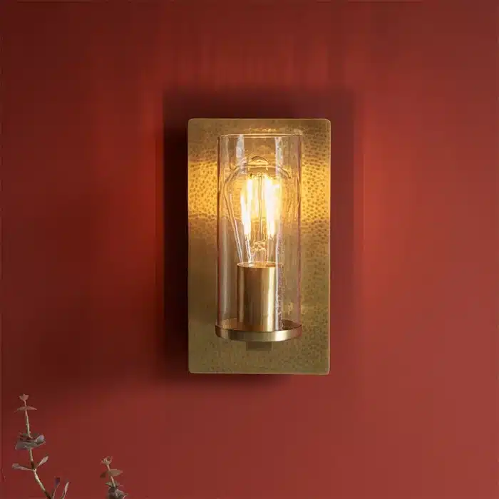 Brass hammered wall light clear glass shade