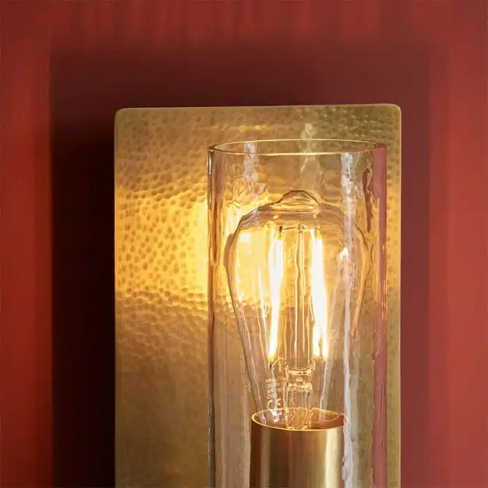 Brass hammered wall light clear glass shade