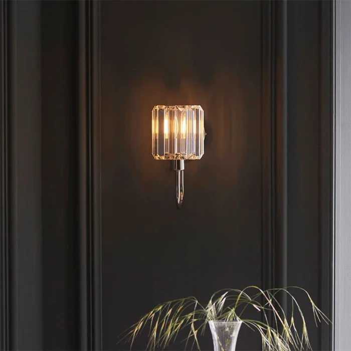 Wall light in bright nickel plated finish