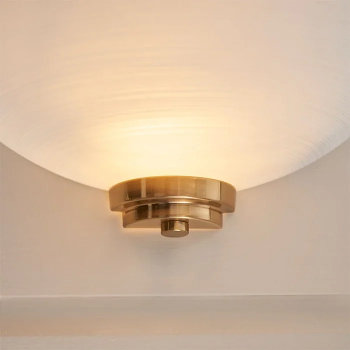 Wall light in brushed brass finish