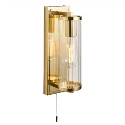 Bathroom wall light in brushed gold finish with clear glass shade