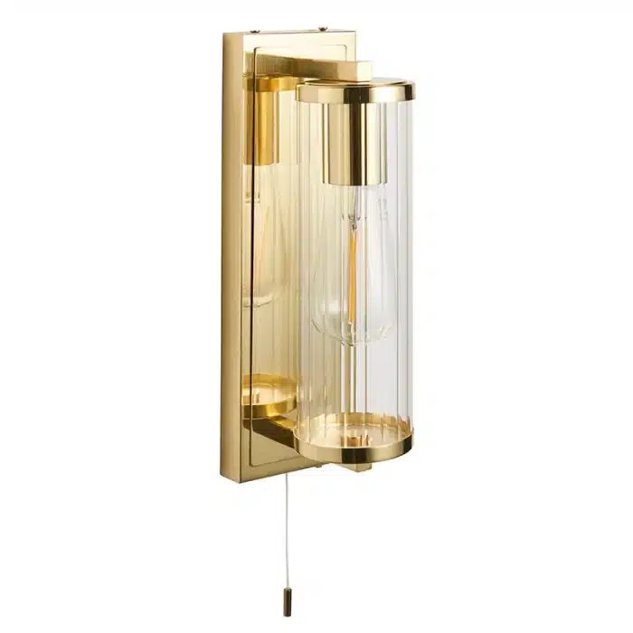 Bathroom wall light in brushed gold finish with clear glass shade