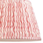 Fabric lamp shade in coral pink colour with plain inner lining