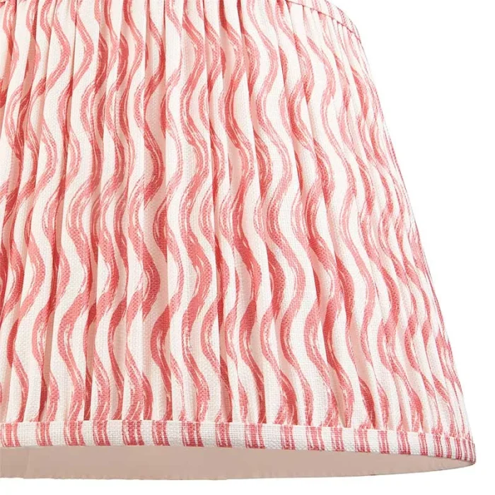 Fabric lamp shade in coral pink colour with plain inner lining