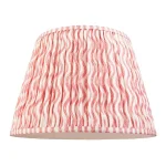 Fabric lamp shade in coral pink colour with plain inner lining