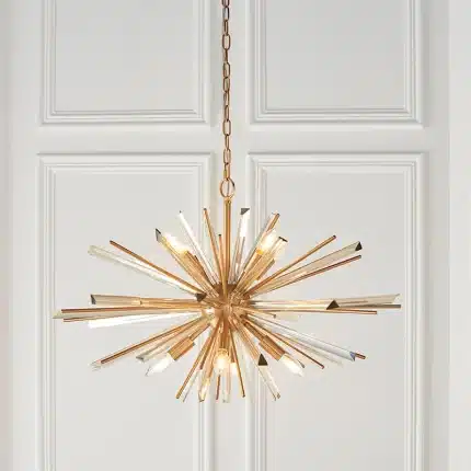 Large antique brass plated pendant light in starburst design for sitting room. living room and hallway