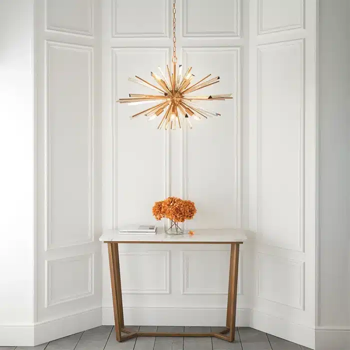 Large antique brass plated pendant light in starburst design for sitting room. living room and hallway