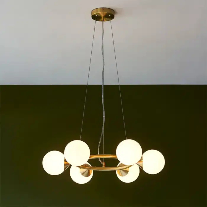 Rind design pendant light in satin brushed gold finish with gloss white glass shades