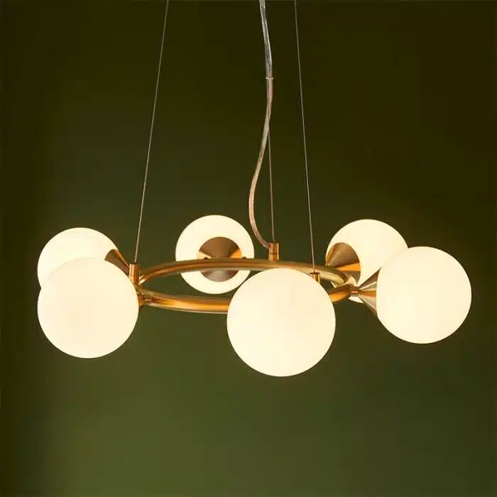 Rind design pendant light in satin brushed gold finish with gloss white glass shades