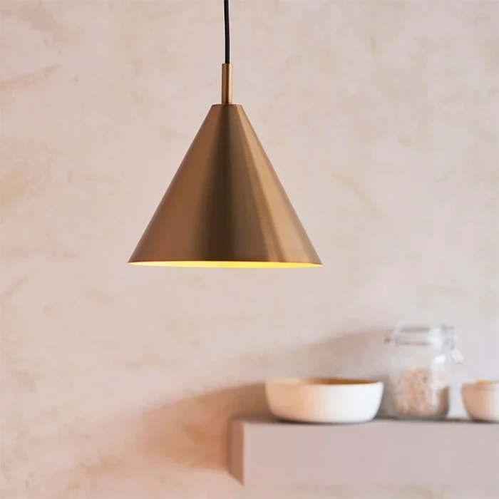 Single pendant light in warm antique brass finish